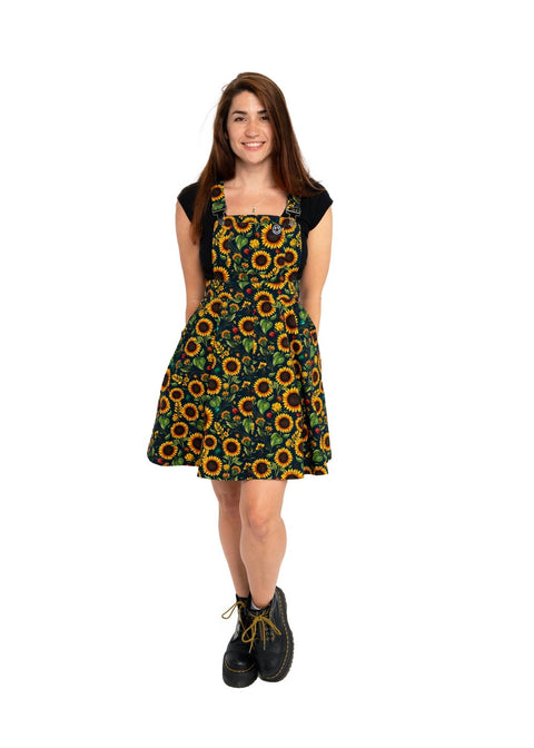 Rebel Romance Sunflowers pinafore swing jurk petrol met zonnebloemen